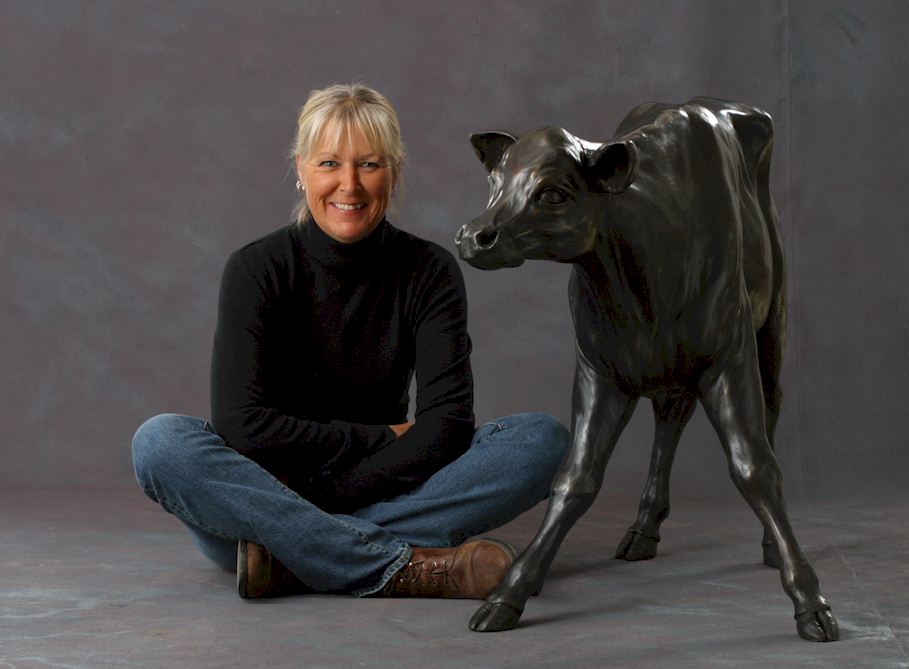 Nicola Prinsen artist with calf
